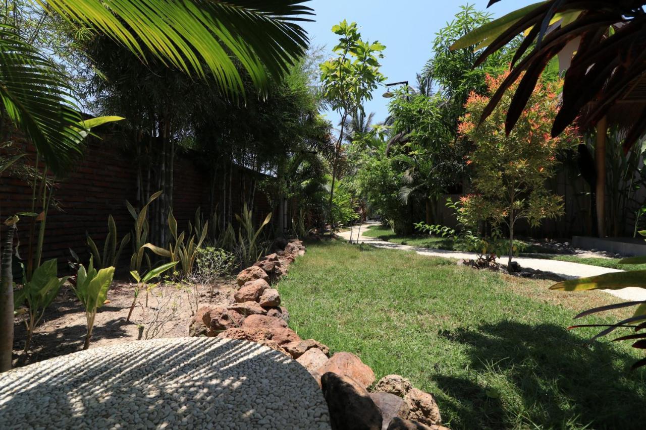 Albany Home Stay Kuta  ภายนอก รูปภาพ